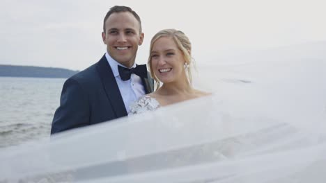 Bride-and-groom-happily-laugh-together