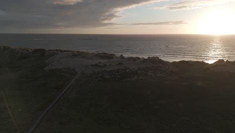 Sunset-view-over-Ofir-Beach-in-Esposende,-Portugal,-showcasing-coastal-dunes-and-the-serene-ocean