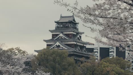 Tourists-At-Top-Floor-Of-Hiroshima-Castle-In-Spring-In-Hiroshima,-Japan