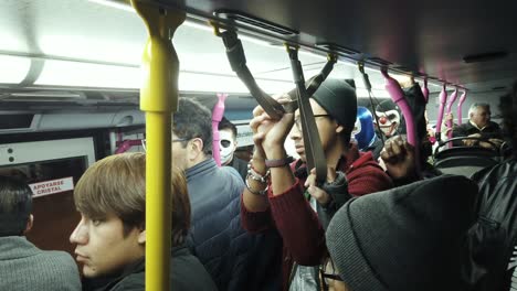 PEOPLE-TRANSFERING-IN-MEXICO-CITY-METROBUS-ON-DEAD-DAY