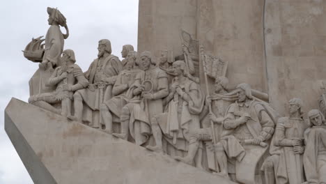 Lisbon,-Belem-Monuments-of-the-Discoveries-Status-footage-zooming-in-from-the-left-side-of-the-statue-getting-closer-towards-to-the-edge