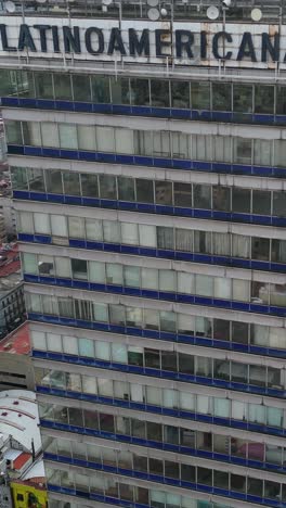 Aerial-approach-vertical-shot-of-a-building-in-CDMX