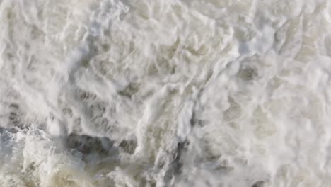 Powerful-cascading-waterfall-in-Owen-Sound,-Canada,-captured-in-a-dynamic-close-up-view