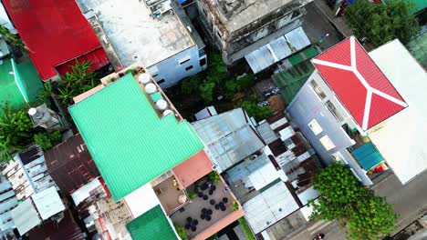 Drone-Ascend-Above-Homes-In-Dense-Urban-Area-Neighborhood