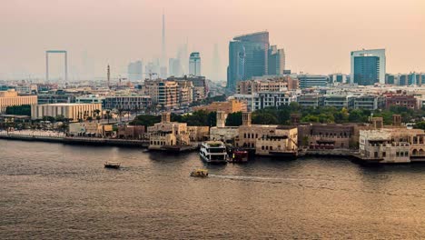 Zeitraffervideo-Mit-Burj-Khalifa,-Dubai-Frame,-Al-Seef-Gebiet-Und-Der-Skyline-Von-Dubai-Bei-Sonnenuntergang