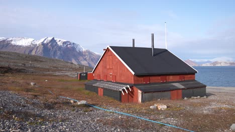 Buildings-on-Coast-of-Greenland-and-Kong-Oscar-Fjord-on-Sunny-Summer-Day