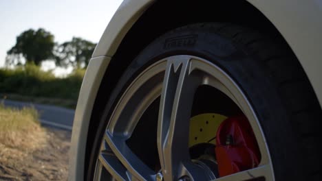 tilt-shot-of-a-Maserati-front-wheel