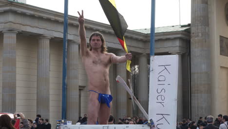 A-naked-man-wearing-an-elephant-covering-his-genitals-is-part-of-a-protest-for-animal-rights-in-Berlin-Germany