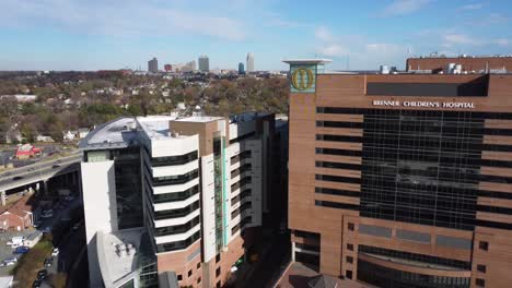 Brenner's-Children's-Hospital-in-Winston-Salem,-NC-with-Skyline-in-background