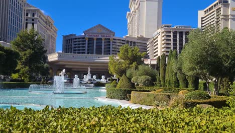 Caesars-Palace-Fountains-and-Casino-Hotel-Buildings-on-Hot-Sunny-Day,-Las-Vegas-NV-USA