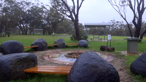 Park-With-Seats-And-A-Camp-Fire-Place-On-A-Wet-And-Windy-Day