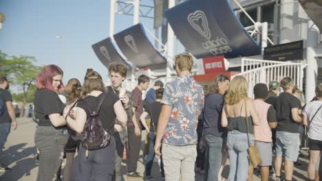 Group-Of-Young-People-Waiting-Outside-The-Budweiser-Stage-In-Toronto,-Canada-During-Live-Concert-Of-A-Famous-Band