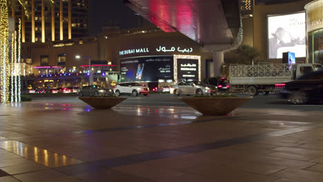 Shopping-mall-exterior-with-coffees-and-restaurants-timelapse-in-Dubai,-United-Arab-Emirates