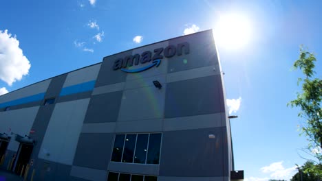 Amazon-van---truck-drives-away-from-Amazon-warehouse-fish-eye-lens