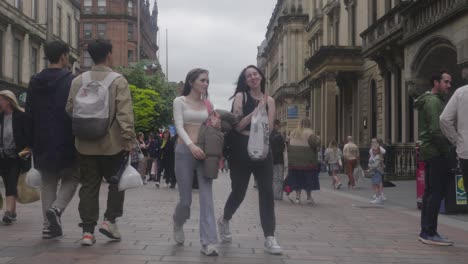 Children-playing,-people-walking,-city-retail-buildings,-Buchanan-Street