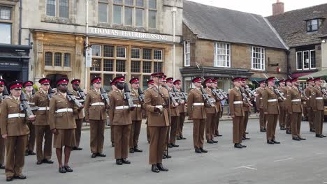 Soldiers-of-the-British-regiment,-the-Royal-Anglian,-stood-to-attention-whilst-on-parade-in-the-market-town-of-Uppingham-in-the-English-county-of-Rutland