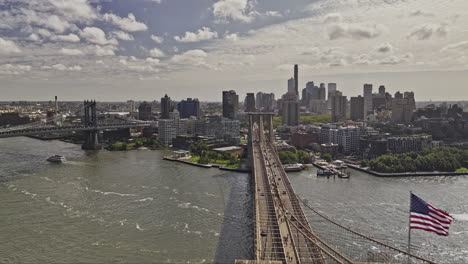 NYC-New-York-Aerial-v404-drone-flyover-Brooklyn-bridge-over-East-river-capturing-cross-river-traffics,-Dumbo-neighborhood-and-downtown-cityscape-views---Shot-with-Mavic-3-Pro-Cine---September-2023