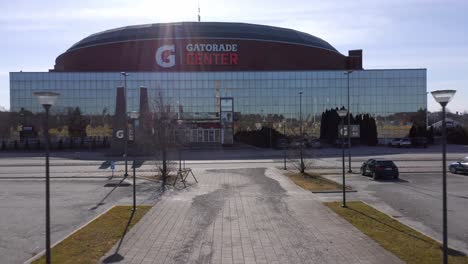 Ground-level-view-zooming-in-at-the-Gatorade-Center-glass-facade-main-entrance