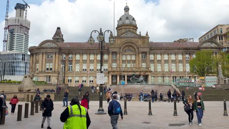 Exterior-street-view-of-Birmingham-Council-House-with-busy-crowds-of-people-in-Victoria-Square-in-Birmingham,-the-Midlands-of-England-UK