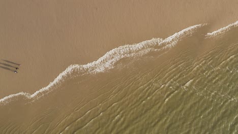 Aerial-panoramic-view-over-the-Port-and-Seaside-of-Cuxhaven-with-a-big-Container-Ship-in-the-distance-on-the-North-Sea