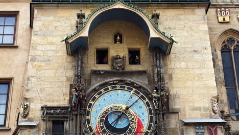 Experience-the-enchantment-of-Prague's-Astronomical-Clock-tower,-as-its-intricate-characters-come-alive,-weaving-a-tale-of-time-and-history-in-the-heart-of-the-city