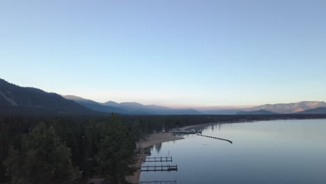 Drone-shot-above-lake-tahoe-at-sunrise