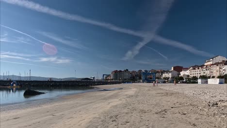 teenage-boys-transport-rowing-canoes-to-the-seashore-to-do-rowing-practice-at-the-sports-school-during-the-summer-holidays-a-sunny-morning,-shot-blocked