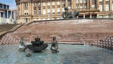 View-of-The-River-Floozie-in-the-Jacuzzi-fountain-with-flowing-water-in-Victoria-Square,-Birmingham-City,-the-Midlands,-England-UK