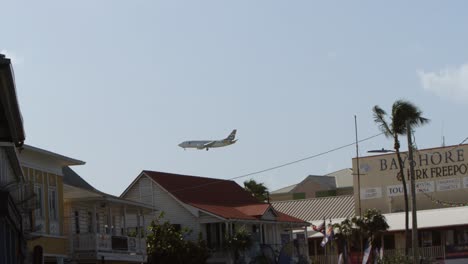 Airplane-descends-for-landing-in-a-tropical-paradise