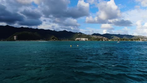 aerial-shot-closing-in-on-canoes-paddling-to-shore