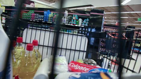 Shopping-cart-rides-around-the-store,-view-from-inside-the-shopping-cart,-time-lapse