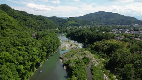 Slow-aerial-drone-flight-over-stunning-Chichibu-landscape-at-Nagatoro-in-Japan