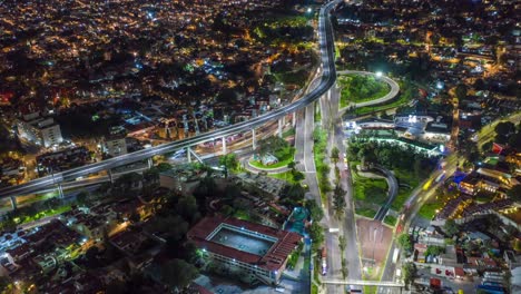 Aerial-hyperlapse-hover-Mexico-City-with-highway-lights-at-night