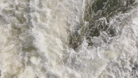 Cascading-waterfall-in-owen-sound,-canada-showing-powerful-white-water-flow,-aerial-view