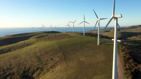 Wind-turbine-farm-aerial-shot-in-coastal-South-Australia,-renewable-energy