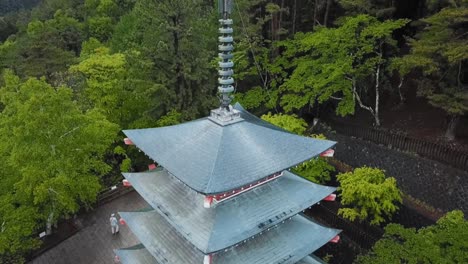 Chureito-Pagoda-during-a-rainy-and-foggy-day,-slow-motion-24fps-out-of-50fps