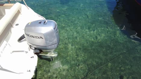 Rotating-view-of-small-boats-in-the-marina-at-Elafiti-Islands,-Croatia,-capturing-the-concept-of-nautical-charm-and-coastal-tranquility