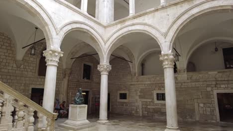 The-interior-hallway-view-of-the-Rector's-Palace,-a-museum-in-Dubrovnik,-Croatia,-epitomizes-the-historical-grandeur-and-cultural-richness-of-this-iconic-landmark