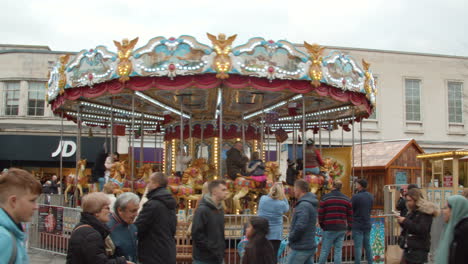 Wide-panning-shot-of-carousel-at-southampton-Christmas-market