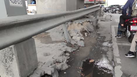 Broken-Footpath-on-Street-in-Bangkok,-Thailand