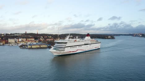 Viking-Line-Cinderella-cruise-ship-enters-Stockholm,-Stadsgården-terminal