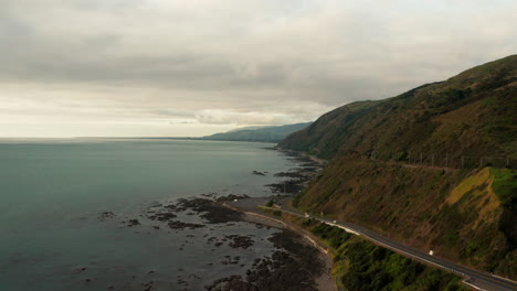 UHD-drone-shot-looking-north-up-the-East-Coast-of-New-Zealand,-from-Pukerua-Bay