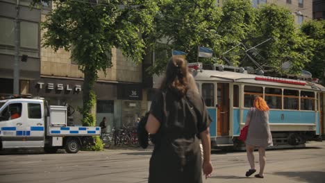 Old-historical-tram-driving-through-central-Gothenburg,-Sweden