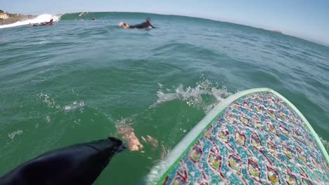 POV-surfing-Mundaka-Left-hand-Point-Break-on-a-river-mouth-a-surfer-in-action-riding-a-barrel-moving-past