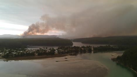 Drone-circles-Burrill-Lake-Bushfire,-Australia-2019