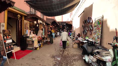 Marrakech-Morocco-medina-market-stalls-walking-POV-point-of-view,-souvenirs