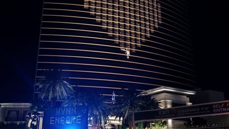 Police-Car-and-Lights-in-Front-of-Closed-Wynn-Encore-With-Heart-Symbol,-Las-Vegas-Nevada-USA-During-Coronavirus-Outbreak-and-Lockdown