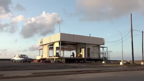 Old-cafe-on-the-Malecon-promenade-in-Havana,-Cuba-few-days-after-cyclone-Irma