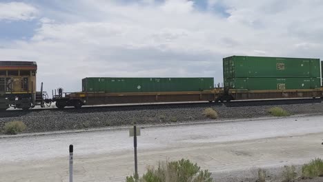 Freight-train-along-Interstate-80-freeway-in-Utah