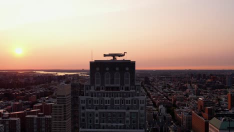 Aerial-view-in-front-of-the-Claremont-Hall,-sunset-in-NYC,-USA---descending,-drone-shot